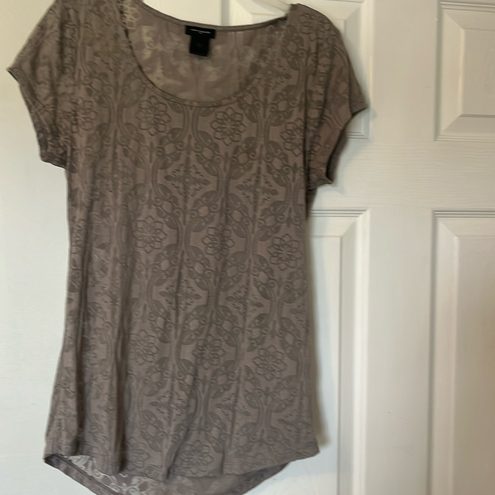 See through tee; size medium; barely worn; perfect condition; light brown/tan